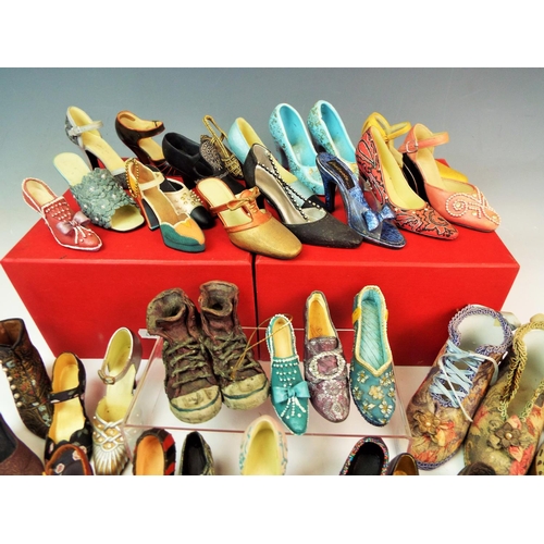 117 - A Large selection of decorative shoes 