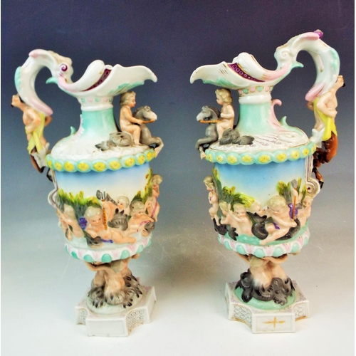 119 - Antique pair of Sitzendorf mythological porcelain ewers  A/F