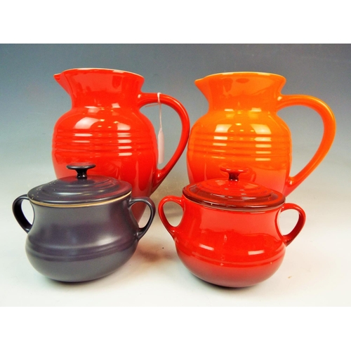 133 - 2 LE Creuset large jugs & 2 lidded pots.