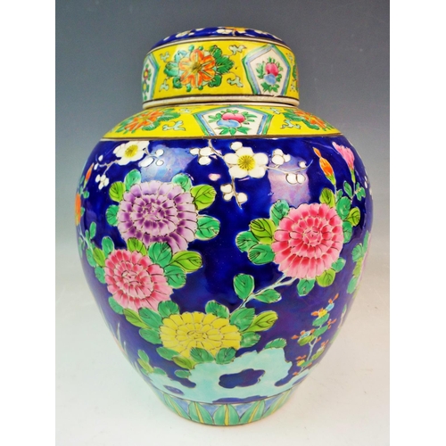 138 - Large Chinese Ginger jar with peacock decoration. Approx 11