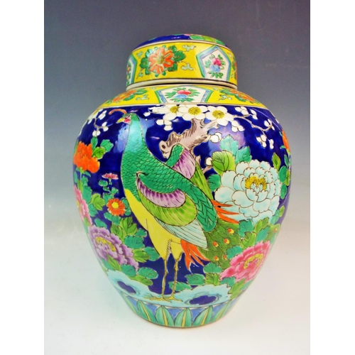 138 - Large Chinese Ginger jar with peacock decoration. Approx 11