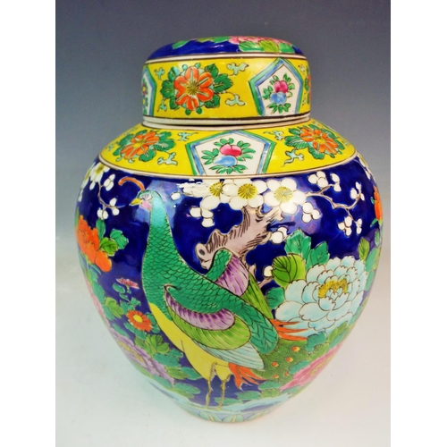 138 - Large Chinese Ginger jar with peacock decoration. Approx 11