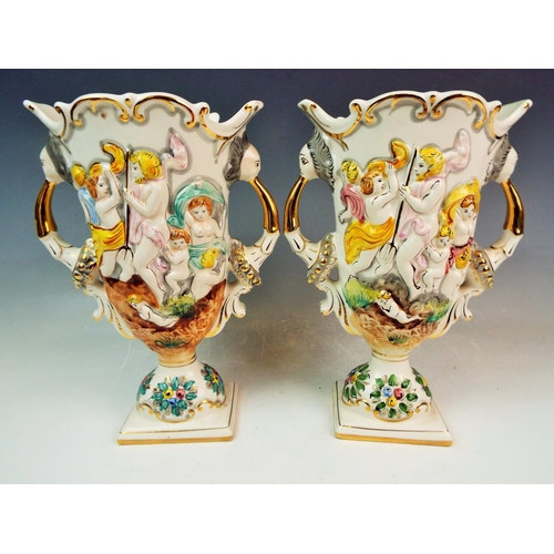 142 - Pair of Alcobaca portugese pottery mythical vases.