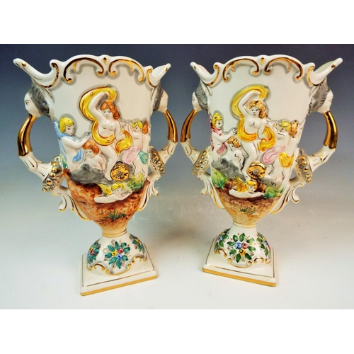 142 - Pair of Alcobaca portugese pottery mythical vases.