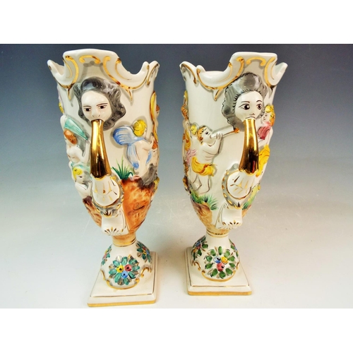 142 - Pair of Alcobaca portugese pottery mythical vases.