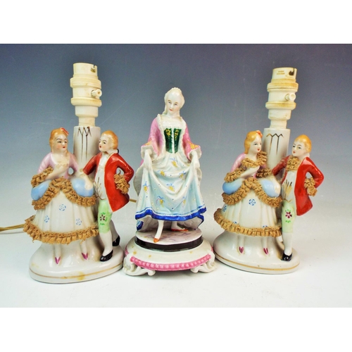 151 - Pair of continental figurine table lamps plus 1 other figurine (the lamps require rewiring.)