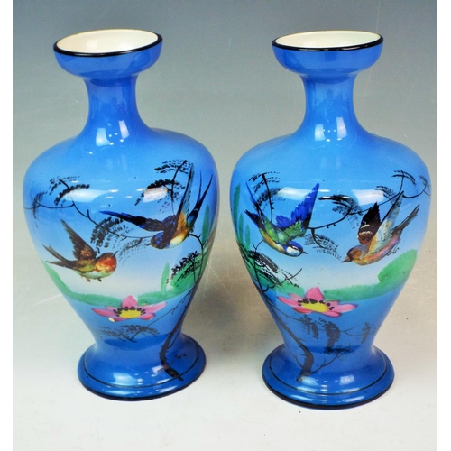 159 - A Pair of Troy art pottery vases decorated with birds. Excellent condtion, They measure 9 inches tal... 