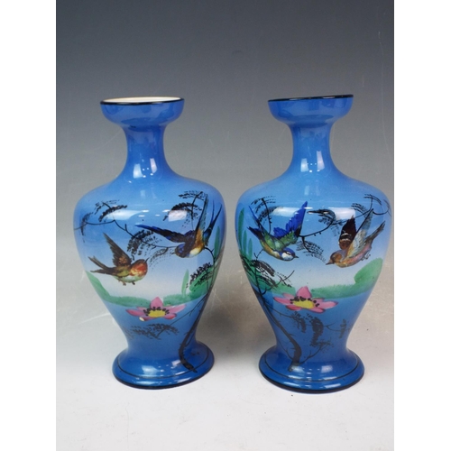 159 - A Pair of Troy art pottery vases decorated with birds. Excellent condtion, They measure 9 inches tal... 