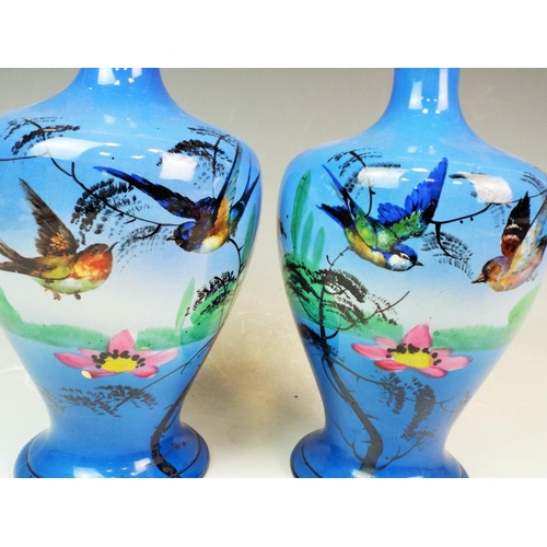 159 - A Pair of Troy art pottery vases decorated with birds. Excellent condtion, They measure 9 inches tal... 