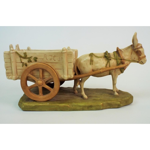 168 - Royal Dux bisque figurine of a donkey and cart. 12