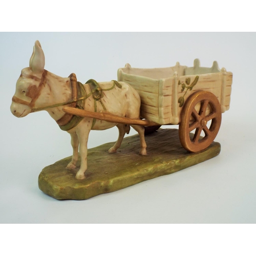 168 - Royal Dux bisque figurine of a donkey and cart. 12