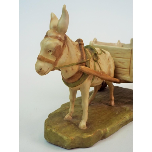 168 - Royal Dux bisque figurine of a donkey and cart. 12