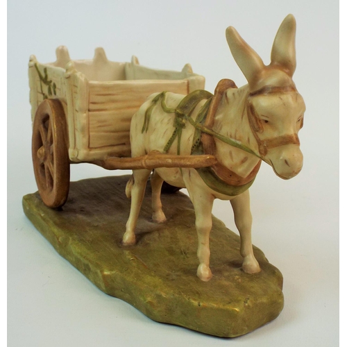 168 - Royal Dux bisque figurine of a donkey and cart. 12