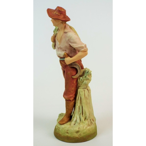 170 - Royal Dux bisque figurine of a harvest farmer, 11