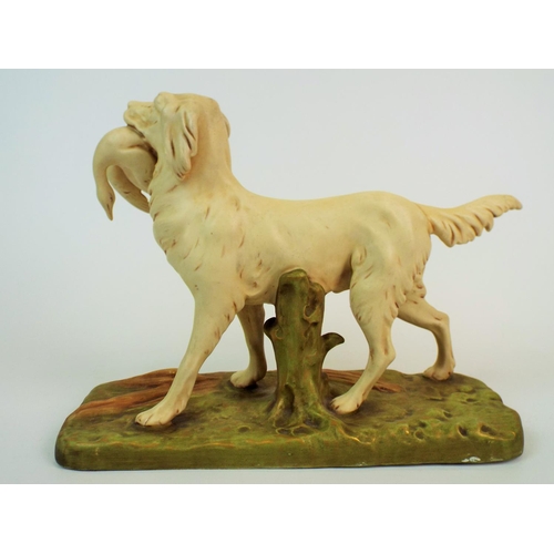 172 - Royal Dux bisque figurine of a hunting dog carrying a duck, 10