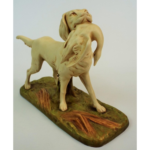 172 - Royal Dux bisque figurine of a hunting dog carrying a duck, 10