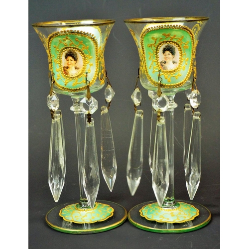 189 - A pair of Bohemian small wine glass lustres with portrait panel, hand decorated in green and gold, a... 