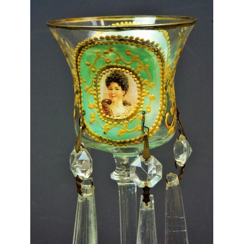 189 - A pair of Bohemian small wine glass lustres with portrait panel, hand decorated in green and gold, a... 