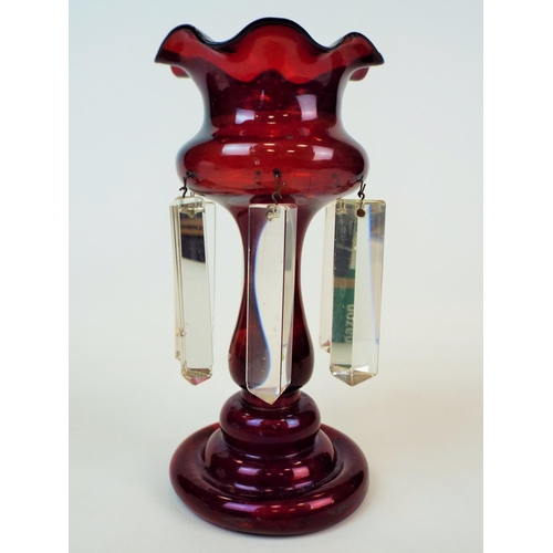 212 - Cranberry glass Victorian lustre, some slight chips to the lustres, 7.5