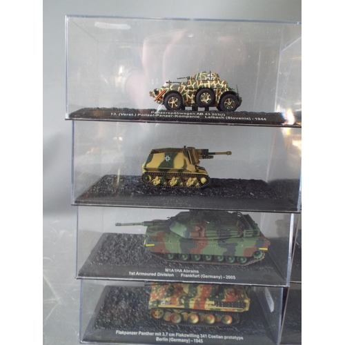 459 - Eight, Die cast models of Amoured Vehicles. All in perspex boxes and in unused condition. See photos