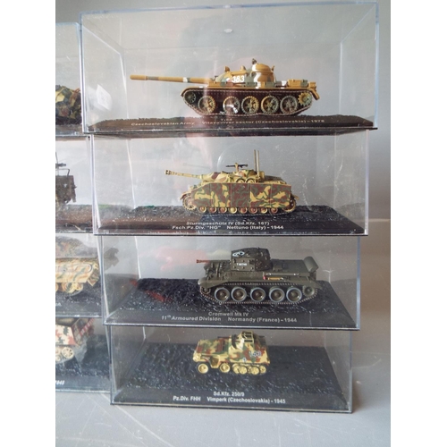 468 - Eight, Die cast models of Amoured Vehicles. All in perspex boxes and in unused condition. See photos