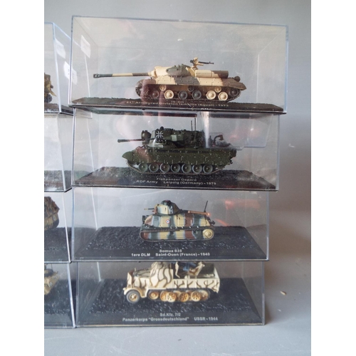 473 - Eight, Die cast models of Amoured Vehicles. All in perspex boxes and in unused condition. See photos