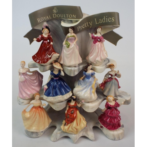 236 - Royal Doulton 10 miniature pretty ladies and stand ( one is damaged )