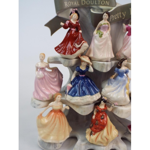 236 - Royal Doulton 10 miniature pretty ladies and stand ( one is damaged )