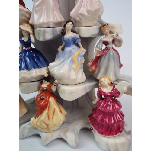 236 - Royal Doulton 10 miniature pretty ladies and stand ( one is damaged )