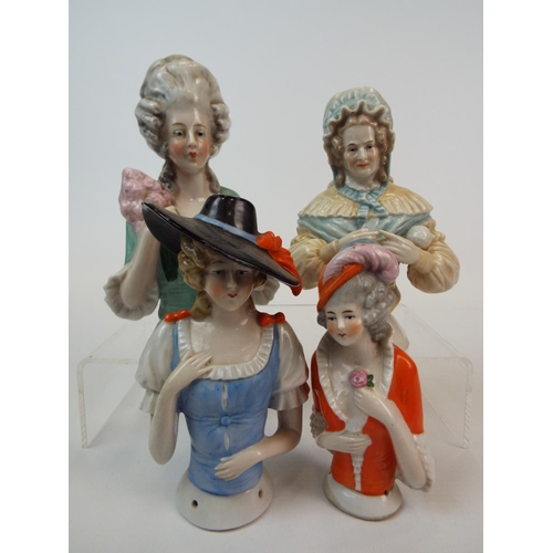 244 - 4 Vintage large porcelain half dolls , pin cushion dolls. Tallest measures 15cm smallest 12cm.