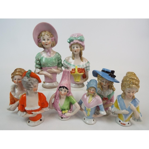 248 - 8 Vintage porcelain half dolls , pin cushion dolls. Tallest measures 12.5 cm smallest 8.5cms.