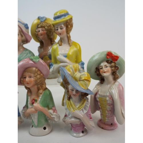 249 - 8 Vintage porcelain half dolls , pin cushion dolls. Tallest measures 10cm smallest 8cms.