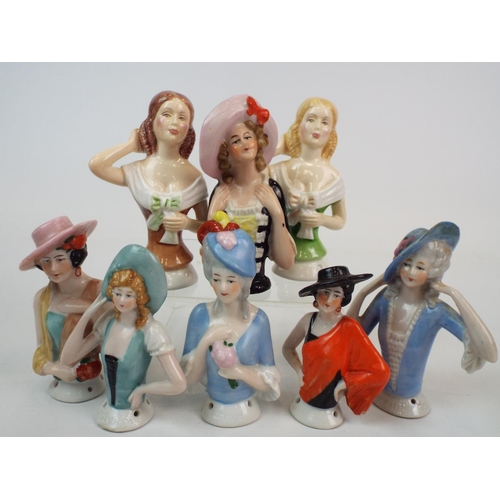 250 - 8 Vintage porcelain half dolls , pin cushion dolls. Average height 9cms.