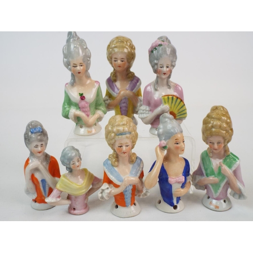 251 - 8 Vintage porcelain half dolls, pin cushion dolls. Average height 7cms.