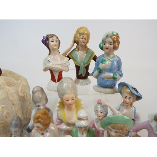 254 - 15 Vintage porcelain half dolls, pin cushion dolls including 1 that is complete with legs.