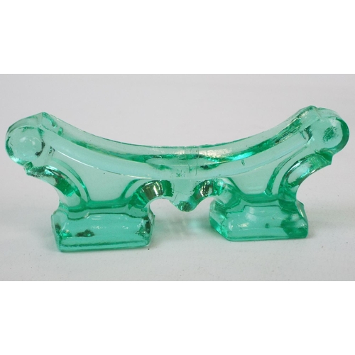 256 - A set of 8 sea green art deco glass knife rests.