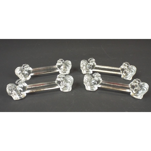 261 - 4 Vintage crystal glass knife rests with cockeral design to each end.