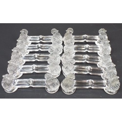 264 - 10 Vintage crystal glass knife rests with chickens on each end.