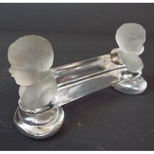 267 - Pair of Baccarat french crystal glass knife rests with frosted cherub heads to each side.