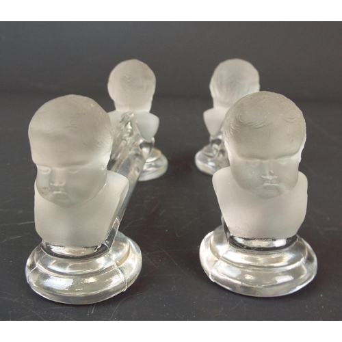 267 - Pair of Baccarat french crystal glass knife rests with frosted cherub heads to each side.