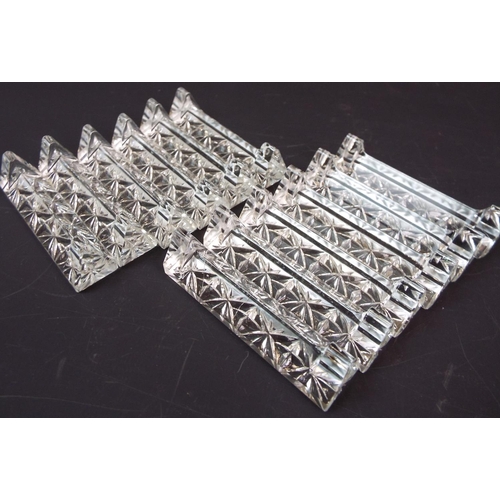 270 - 12 Matching crystal glass knife rests.