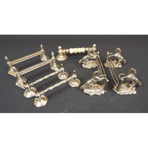 277 - 3 Pairs of white metal knife rests in different designs & 1 single rest.