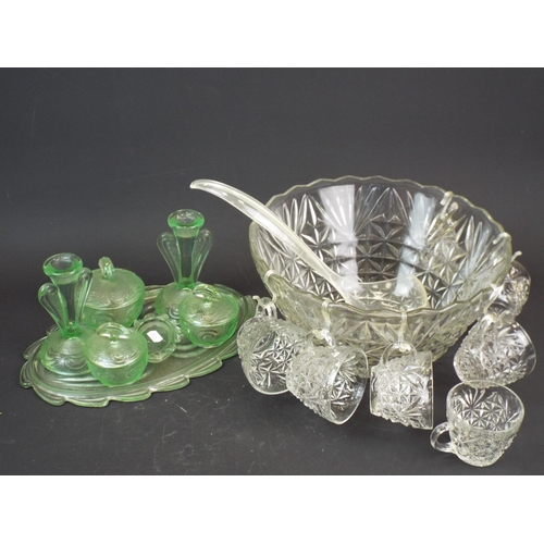 371 - A vintage pressed glass punch bowl set & a art deco green glass dressing table set.