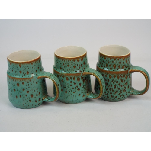 374 - 3 Poole pottery cups in a motiled green and browm lava style pattern.