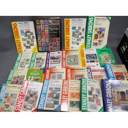 326 - Large selection of Stanley Gibbons Stamp catalogues. See photos