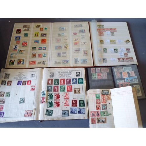 335 - Assorted albums of World stamps. See photos