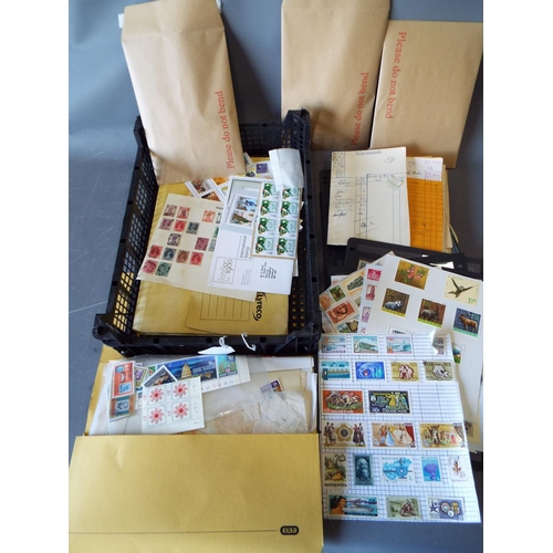 337 - Large tray of loose stamps and stamps on album pages. See photos