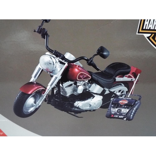 383 - Radio controlled Harley Davidson Motorcycle with real sounds. Made by Marks & Spencer, boxed and unu... 