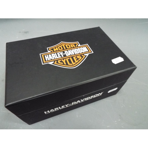 384 - Harley Davidson 1:12 Scale die cast model set in a foam lined presentation case. In unused condition... 