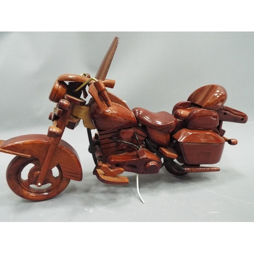 386 - Wooden model of a V Twin Motorcycle. Approx 10 inches long. See photo